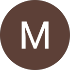 M B